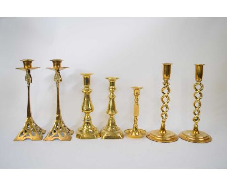 Collection of brass candlesticks, one pair in Art Nouveau style