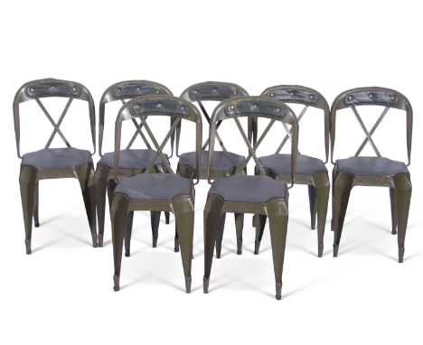 Set of seven vintage Evertaut industrial green painted stacking metal chairs, with green painted frames and upholstered seats