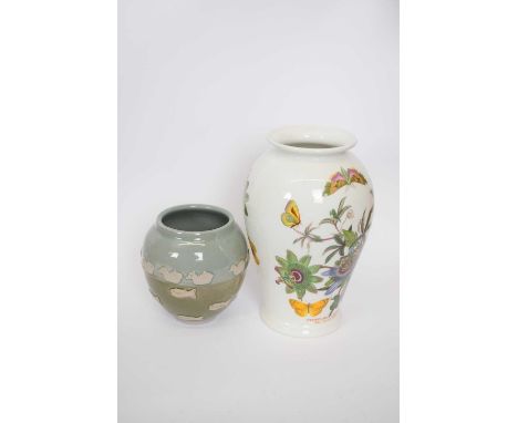 Art pottery vase of fish and doves in relief by Ron Bridge, together with a Portmeirion botanical garden vase, tallest 28cm (