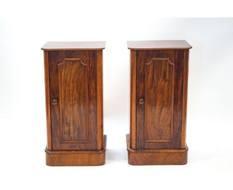 A pair of Victorian mahogany pot cupboards with panel doors, 75cm high x 39cm wide x 32.5cm deep