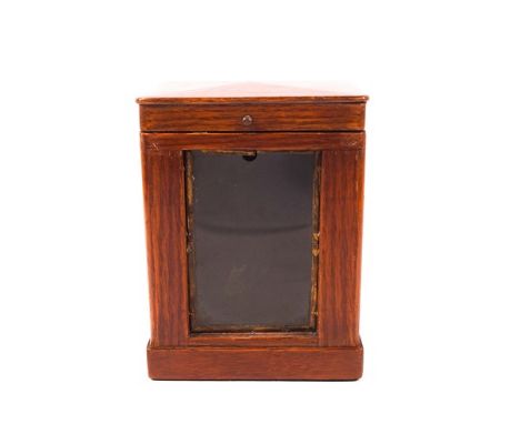 A wooden carriage clock case with green baize lining, 14.5cm high x 11cm wide