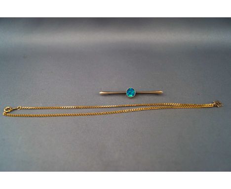 A yellow metal bar brooch set with blue/green opal. Stamped for 9ct gold. Together with a hallmarked 9ct gold curb necklace w