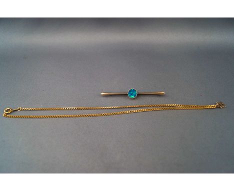 A yellow metal bar brooch set with blue/green opal. Stamped for 9ct gold. Together with a hallmarked 9ct gold curb necklace w