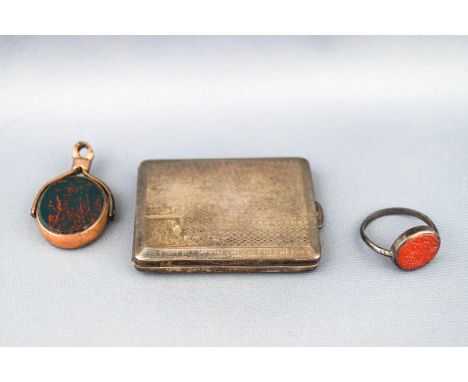 A silver match case, of rectangular form with engine turned decoration around a vacant cartouche, Birmingham 1929, 36 grams, 