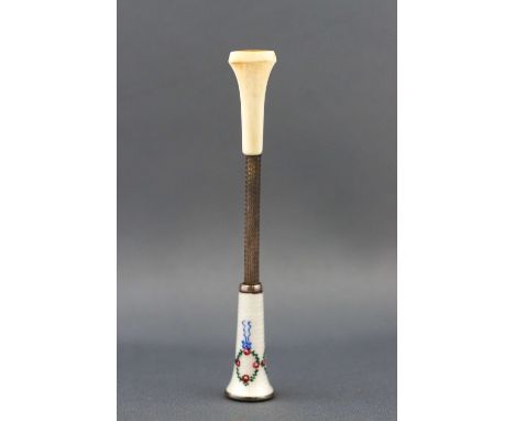 An Edwardian Austrian silver and enamel cigarette holder