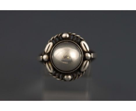 A Georg Jensen "Sterling" Moonlight Blossom ring, stamped with post 1945 makers mark, 1, "Sterling Denmark", ring size Q, 6.3