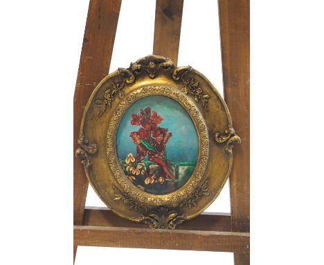 A print of a flower fairy on oval ceramic panel within a gilt frame, 42cm x 38cm overal