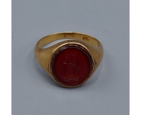 An 18ct gold seal ring with Intaglio Cornelian, 5.3gms, ring size M