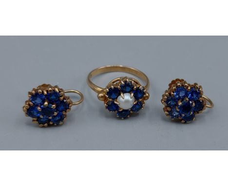 A 9ct gold Sapphire and Pearl set cluster ring, 2.6gms, ring size L together with a pair of 9ct gold Sapphire cluster earring