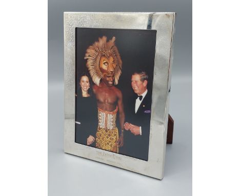 A Birmingham silver photograph frame, engraved The Lion King, London, October 1999, retailed by Aprey and Garrard, 20cms by 1