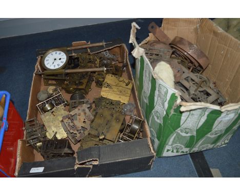 Two Boxes Containing Clock Movements and Spare Parts 