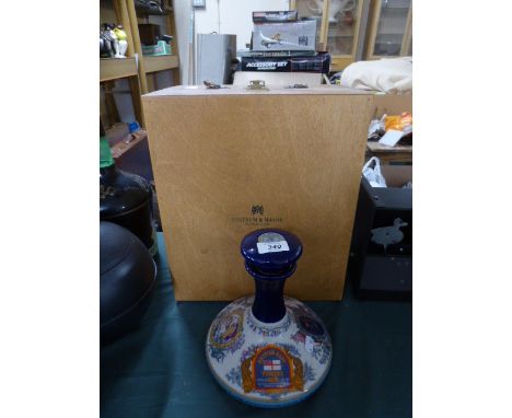 A Fortnum and Masons Wine Box together with a Wade British Navy Pusser's Rum Decanter