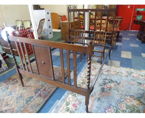 An Edwardian Oak Double Bed Frame with Barley Twist Supports together with Two Bedroom Chairs