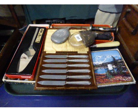 A Tray of Sundries to Include Carving Set, Cutlery, Egg Timer, Place Mats, Hip Flasks 