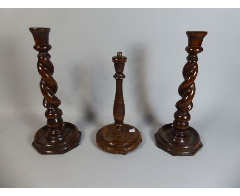 A Pair of Edwardian Oak Barley Twist Candlesticks, 33cm High and an Oak Table Lamp Base