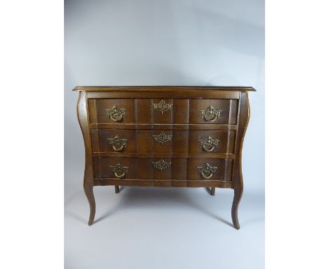 A Mid 20th Century Continental Small Three Drawer Commode Chest in Oak with Serpentine Front, 71cm Wide.