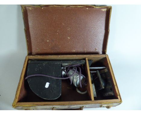 A Vintage Leather Case Containing Magic Lantern with Dallmeyer Lens 