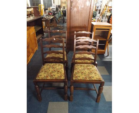 A Set of Four Ladder Backed Dining Chairs with Tapestry Seats