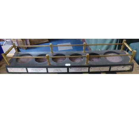 A Brass Mounted Six Bottle Scotch Malt Whisky Stand, 63cm Long