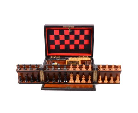 “The Royal Cabinet of Games”, a bird’s eye maple and ebonised games cabinet, with chess men, draughts, markers, board, and ac