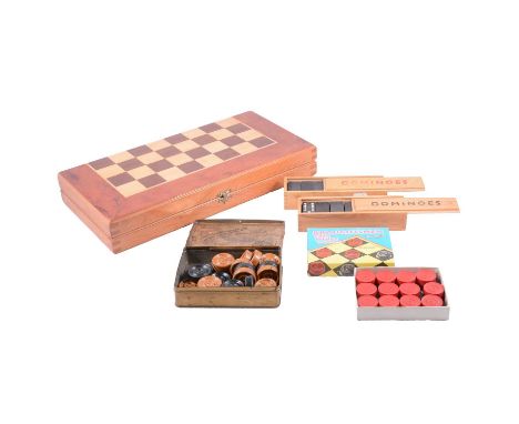 Quantity of dominoes and draughts sets, some in original boxes.