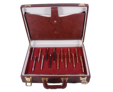 Sheaffer salesman's briefcase with samples, the red leather case with a lift out tray with fourteen pen samples over case, cl