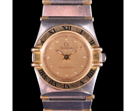 A 1990s lady's Omega Constellation wristwatch, having a calibre 1455 6-jewel quartz movement and circular frosted champagne d