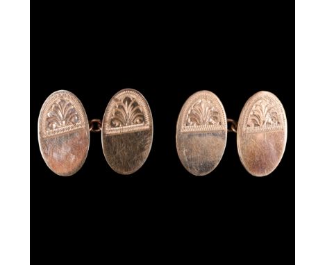 A pair of vintage 9 ct gold cufflinks, having oval faces, the upper halves of each anthemion-engraved, 19 mm x 12 mm, 4.4 g