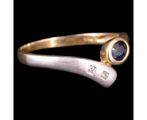 A vintage diamond, sapphire and 18 ct yellow metal asymmetric wishbone ring, comprising two small diamond brilliants flush-se