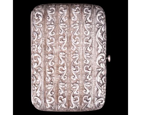 A late 19th Century Kutch silver cigarette case, of ribbed contoured cushion form, chased and engraved in bands of foliate-sc