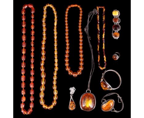 A group of largely contemporary amber jewellery, including a silver-mounted amber bracelet comprising rounded-oblong links of