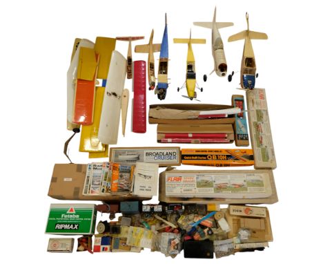 A large group of remote-control model aircraft, together with parts, plans, tools, publications etc