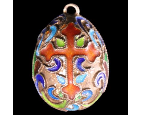 A Russian cloisonne and gilt-white metal oviform pendant, decorated with red enamel Gothic crosses, 18 mm x 15 mm x 15 mm exc