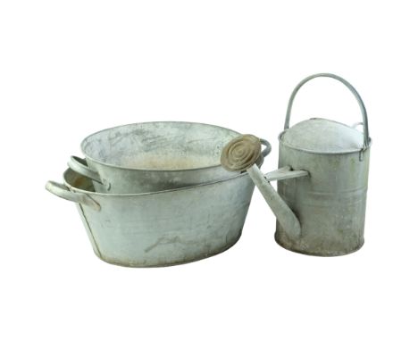 A vintage galvanised steel watering can and two similar baths, largest bath 21 cm x 60 cm x 43 cm 