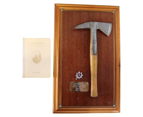 A Kent Fire Brigade presentation fire axe and related book; the axe mounted on a plaque "Presented to FM Tony Clifton for 13 