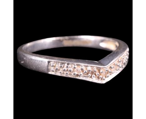 A contemporary diamond and 9 ct white gold wishbone finger ring, set with five small round-cut and millegrain-set stones of a