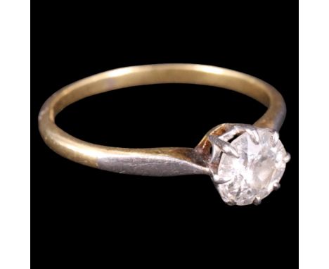A vintage diamond solitaire ring, its brilliant-cut stone of approx 0.8 ct claw-set in precious white metal between the pinch