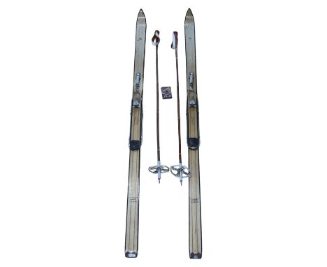 A pair of vintage Skimeister skis and poles together with boxed Holmenkol Piste wax, 200 cm