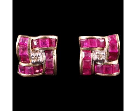 A pair of vintage diamond, ruby and 9 ct gold stud earrings, comprising a central round-cut diamond within a square frame of 