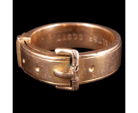 [ Sir Walter Scott ] An antique 14 ct gold buckle locket or memento mori ring, the hinged buckle strap opening to reveal a sm