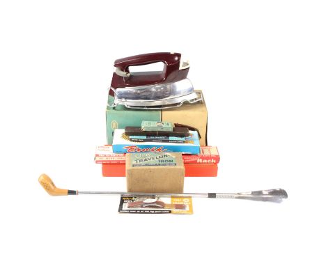 A group of mid 20th Century gentlemen's dressing accessories, including a Hangrite Foldaway Tie Rack, Pifco Electric Trouser 