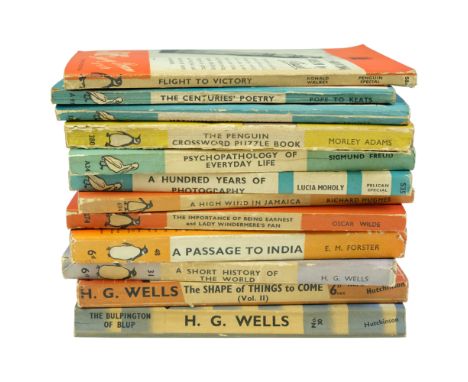 A group of vintage Penguin, Pelican and similar books including, "Mathematician's Delight" and "A Passage to India"
