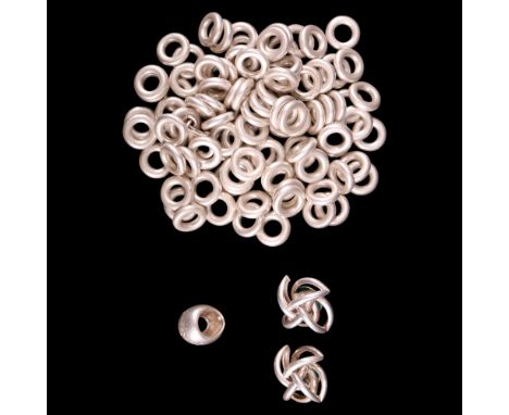 A Links of London Sterling standard white metal signature ring together with a quantity of annuli and a clasp for re-stringin