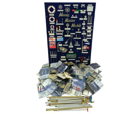 A vintage Mersey Marine Models display board together with a large quantity of new-old-stock component parts