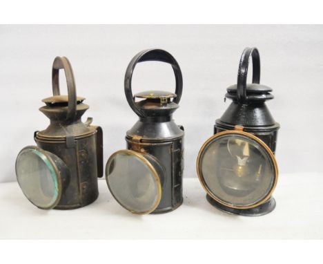 An LMS three-aspect handlamp brass plated LMS 6222 and stamped AMBERGATE (31cm H) An LNWR three-aspect handlamp brass plated 