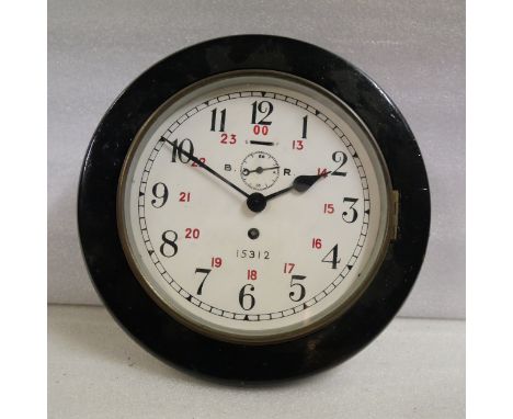 A London Midland and Scottish 7.5" railway clock. White dial signed B.R. 15312. This lot comes with the original Railway Cloc
