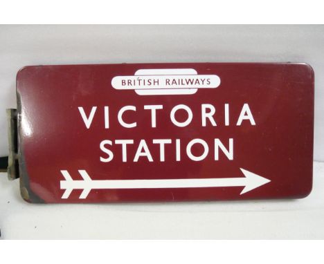 BR(M) fully flanged double-sided enamel station railway sign with British Railways totem, Victoria Station and right-pointing