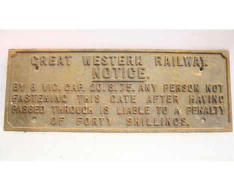 A cast iron GWR Great Western Railway notice sign detailing a forty shilling penalty to those not shutting the gate having pa