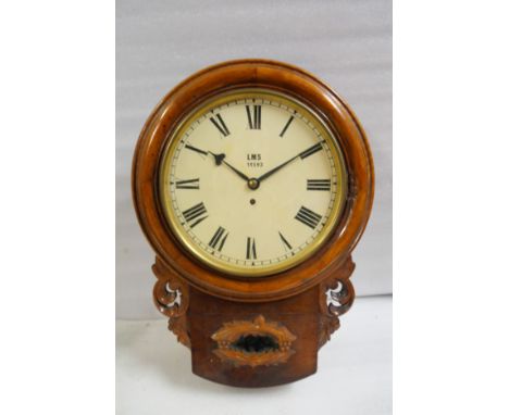 A London Midland and Scottish 12" mahogany cased drop dial trunk railway clock. Fitted with chain driven English fusee moveme