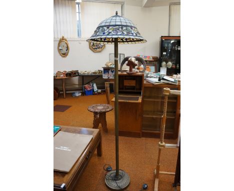 Brass standard lamp with Tiffany style shade